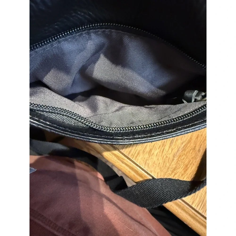 The Sak Black Leather Crossbody Bag‎ Front Zip Pocket Adjustable Strap
